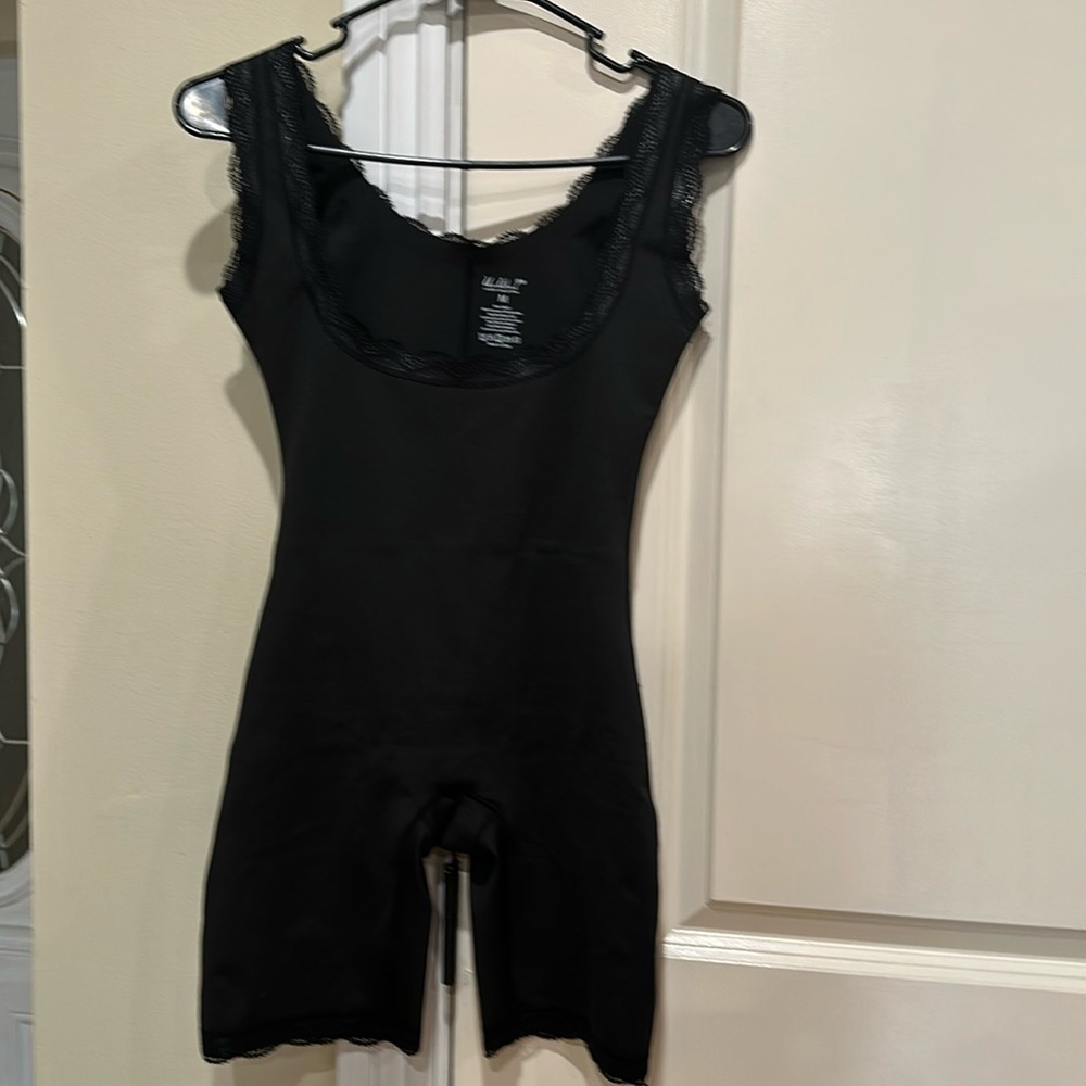 Under Where? Luxury Collection body shape in new condition.  Never worn.
